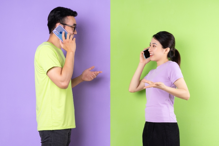 couple long distance talking on phone
