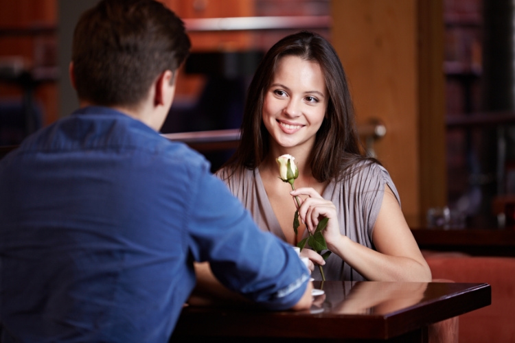 girl getting flower on first date